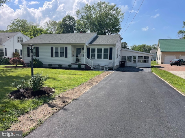 3 Talbot Ave, Cambridge, MD 21613 - view of front of home with a front lawn and a shingled roof