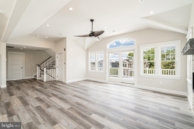 339 11th, Ship Bottom, NJ 08008 - unfurnished living room featuring vaulted ceiling, stairway, a ceiling fan, wood finished floors, and baseboards
