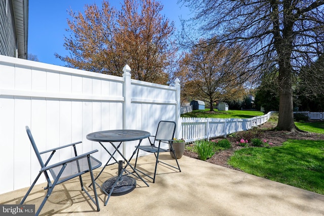view of patio / terrace with fence and outdoor dining area