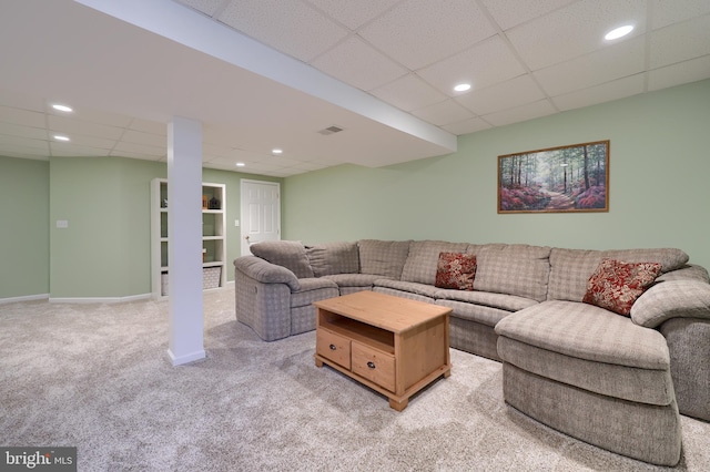 living area with recessed lighting, visible vents, light carpet, and a drop ceiling