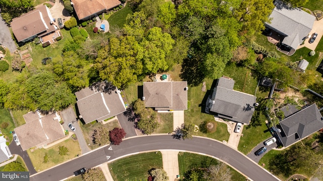 birds eye view of property with a residential view