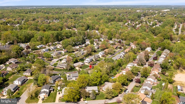 aerial view featuring a residential view and a forest view