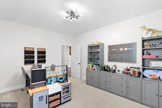 office space with light colored carpet and baseboards