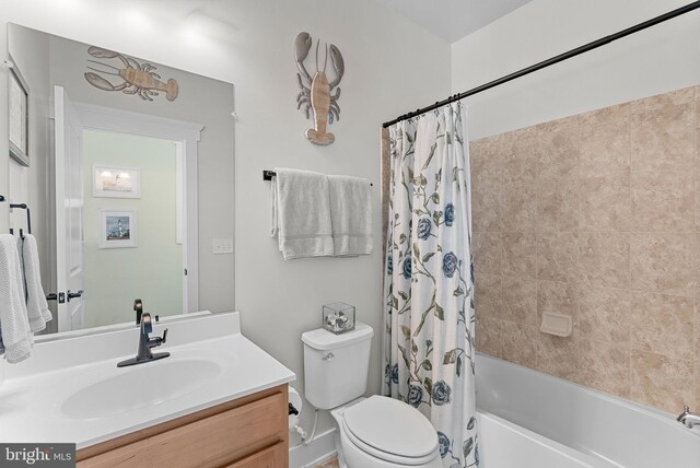 full bath with vanity, shower / bathtub combination with curtain, and toilet