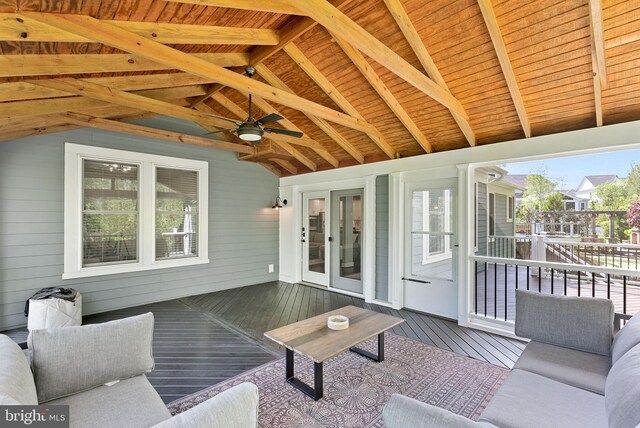 exterior space featuring ceiling fan and a wooden deck