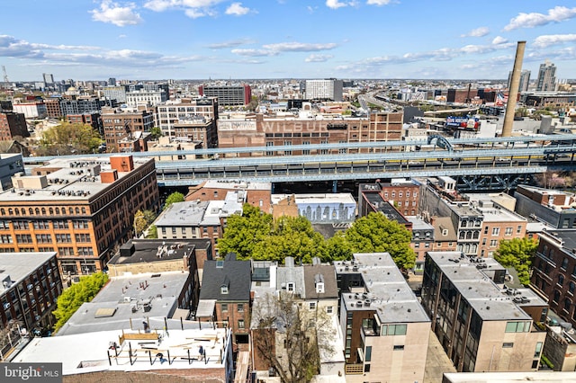 birds eye view of property featuring a view of city