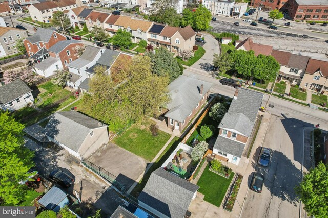 birds eye view of property with a residential view