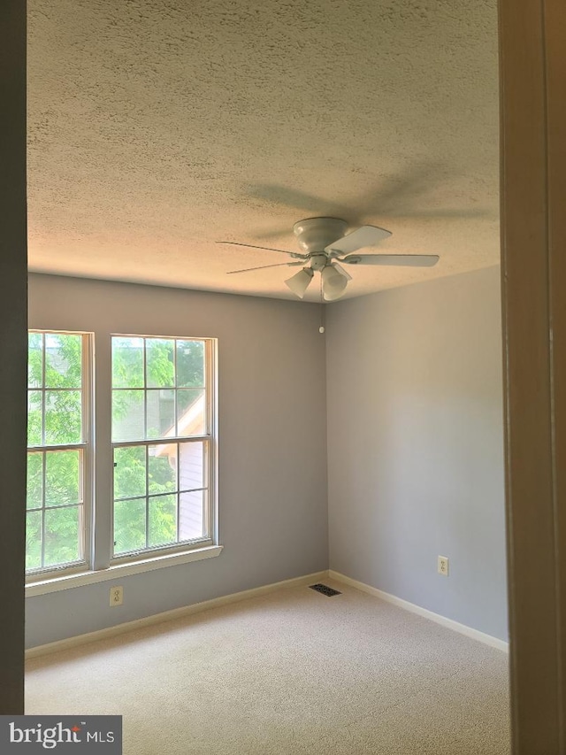 303 Saybrooke View Dr, Gaithersburg, MD 20877 - carpeted spare room featuring a textured ceiling and a ceiling fan