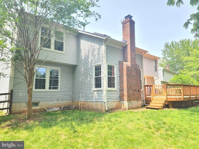 303 Saybrooke View Dr, Gaithersburg, MD 20877 - back of property featuring a chimney, a wooden deck, and a yard