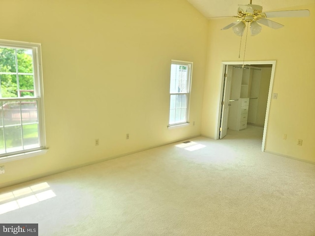 303 Saybrooke View Dr, Gaithersburg, MD 20877 - unfurnished room with carpet flooring, a ceiling fan, and a towering ceiling