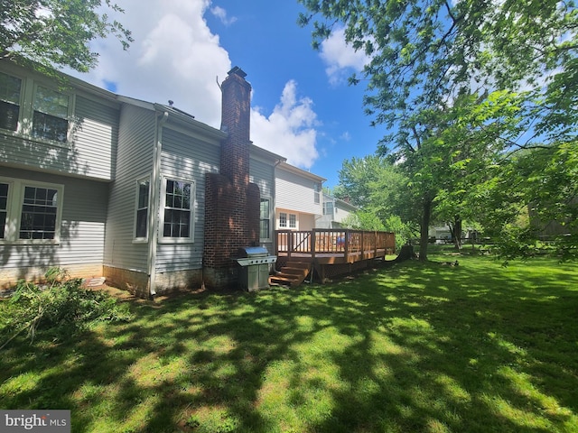 303 Saybrooke View Dr, Gaithersburg, MD 20877 - view of grassy yard with a deck
