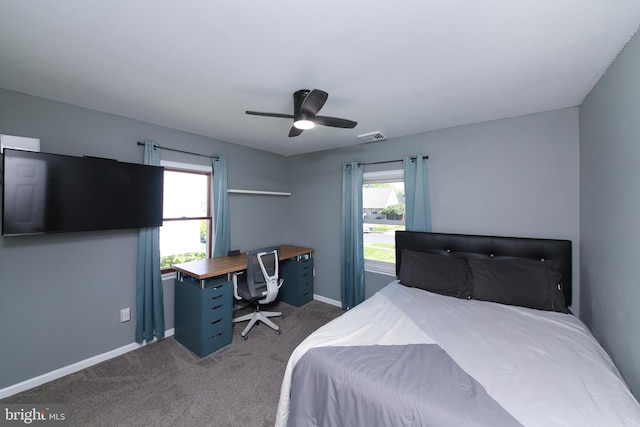 bedroom featuring baseboards, ceiling fan, carpet, and visible vents