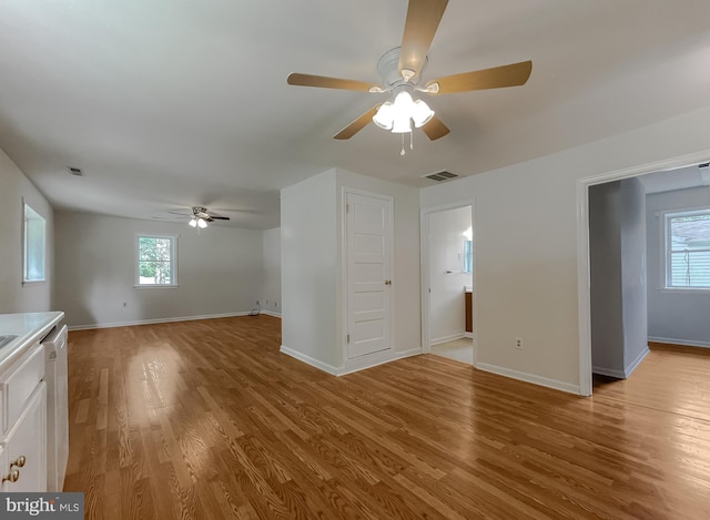 42190 Ridge Rd, Mechanicsville, MD 20659 - unfurnished living room with baseboards, ceiling fan, light wood-type flooring, and visible vents