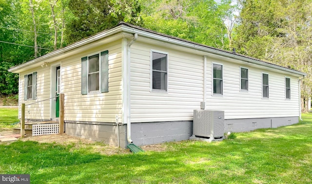42190 Ridge Rd, Mechanicsville, MD 20659 - view of side of home with a yard, central AC, and crawl space