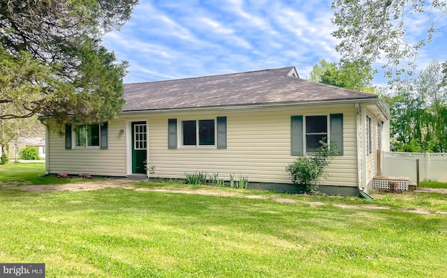 42190 Ridge Rd, Mechanicsville, MD 20659 - view of front of home featuring roof with shingles and a front lawn