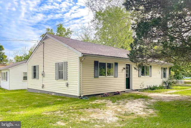 42190 Ridge Rd, Mechanicsville, MD 20659 - view of front of property featuring roof with shingles and a front lawn