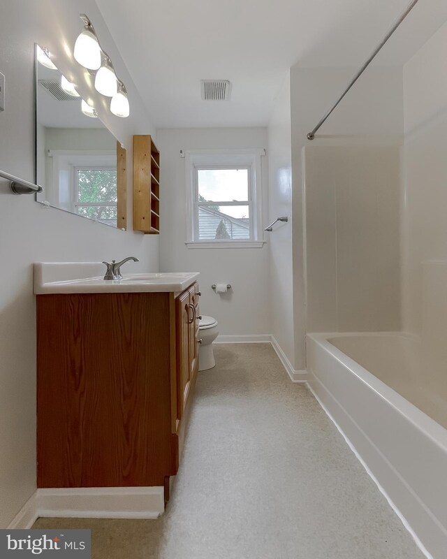 42190 Ridge Rd, Mechanicsville, MD 20659 - bathroom featuring vanity, plenty of natural light, toilet, and visible vents
