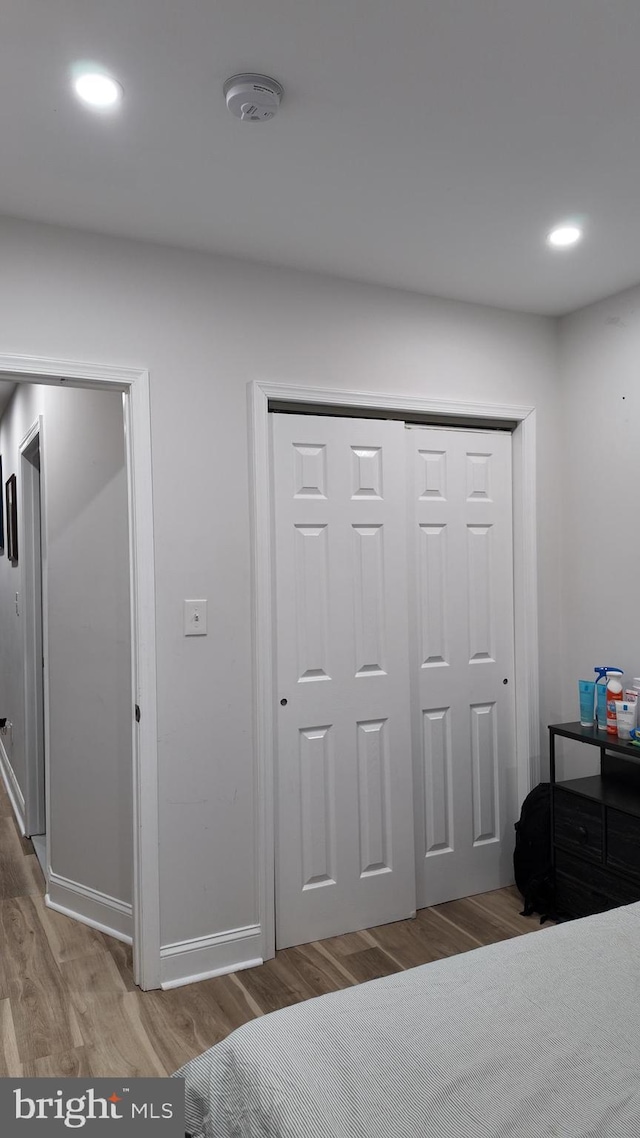 2246 N Hancock St, Philadelphia, PA 19133 - bedroom featuring recessed lighting, baseboards, wood finished floors, and a closet