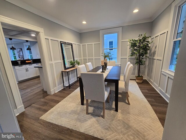1119 Overbrook Rd, Baltimore, MD 21239 - dining space with a decorative wall, dark wood-style floors, recessed lighting, and wainscoting