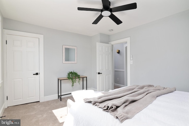 1119 Overbrook Rd, Baltimore, MD 21239 - bedroom with light carpet, baseboards, and a ceiling fan