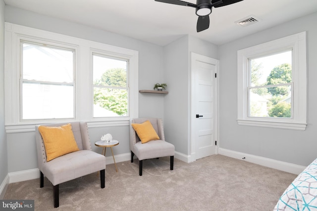 1119 Overbrook Rd, Baltimore, MD 21239 - living area featuring plenty of natural light, carpet flooring, and baseboards