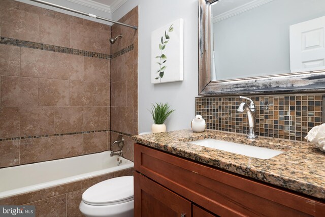 1119 Overbrook Rd, Baltimore, MD 21239 - bathroom featuring crown molding, decorative backsplash, toilet,  shower combination, and vanity