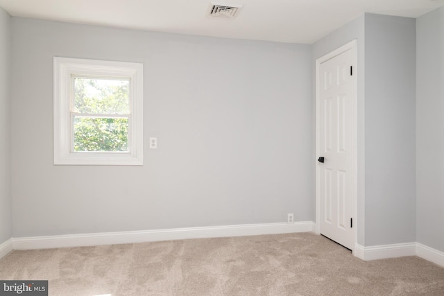 1119 Overbrook Rd, Baltimore, MD 21239 - unfurnished room with light carpet and baseboards