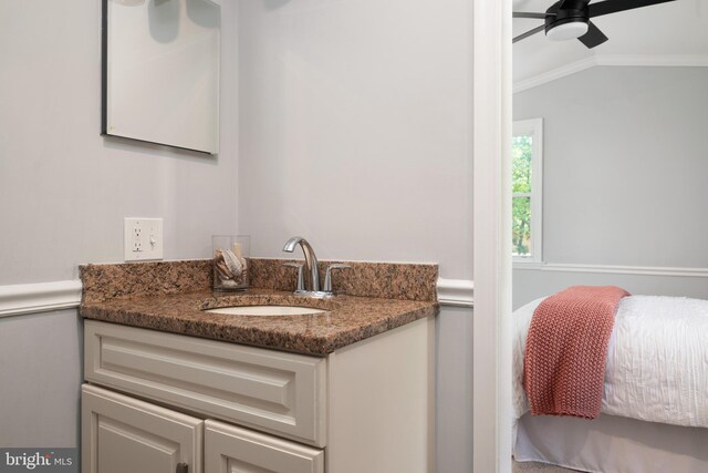 1119 Overbrook Rd, Baltimore, MD 21239 - bathroom featuring vaulted ceiling, crown molding, a ceiling fan, and vanity