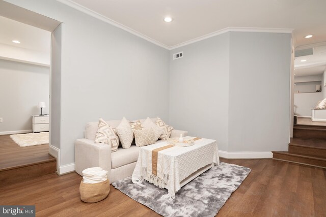 1119 Overbrook Rd, Baltimore, MD 21239 - sitting room featuring wood finished floors, recessed lighting, ornamental molding, baseboards, and stairway