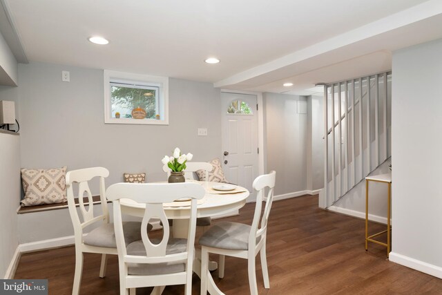 1119 Overbrook Rd, Baltimore, MD 21239 - dining room with baseboards, wood finished floors, stairway, and recessed lighting