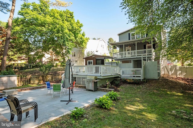 1119 Overbrook Rd, Baltimore, MD 21239 - back of house featuring a patio area and a wooden deck