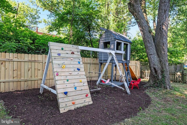 1119 Overbrook Rd, Baltimore, MD 21239 - view of jungle gym with a fenced backyard