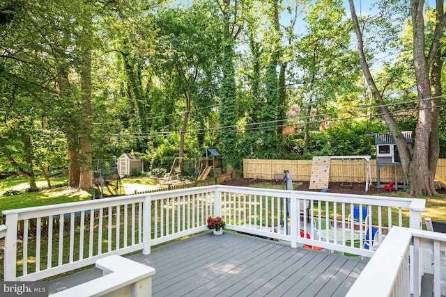 1119 Overbrook Rd, Baltimore, MD 21239 - wooden terrace with a playground and a fenced backyard