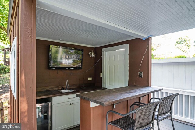 1119 Overbrook Rd, Baltimore, MD 21239 - view of patio featuring beverage cooler