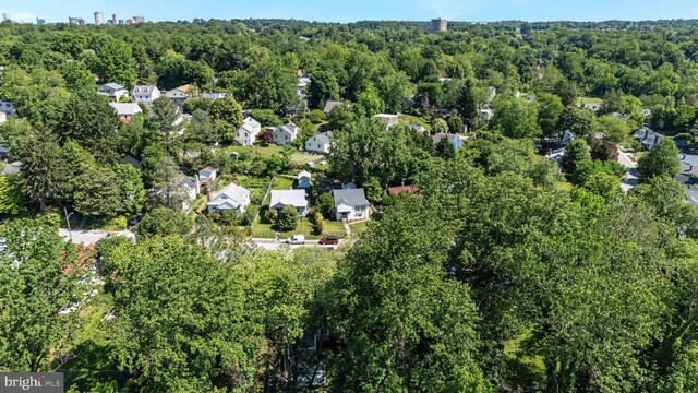 1119 Overbrook Rd, Baltimore, MD 21239 - aerial overview of property's location featuring a heavily wooded area