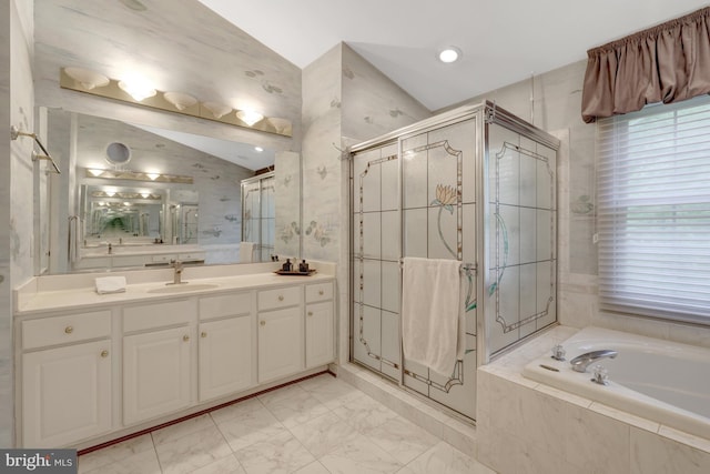 full bath with vanity, a stall shower, a bath, and lofted ceiling