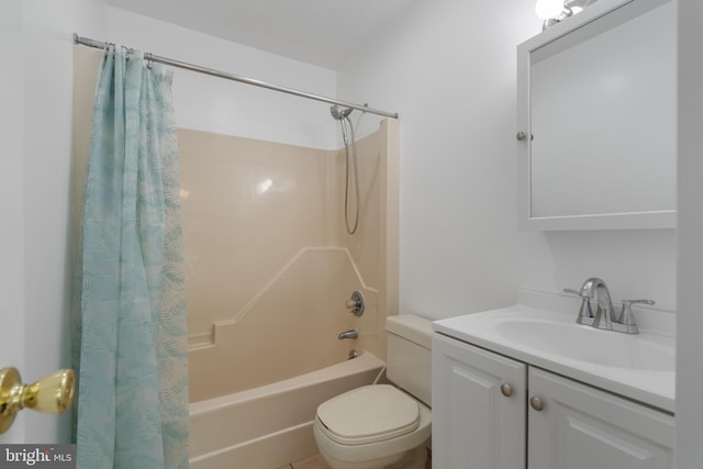 full bathroom with vanity, toilet, and shower / tub combo