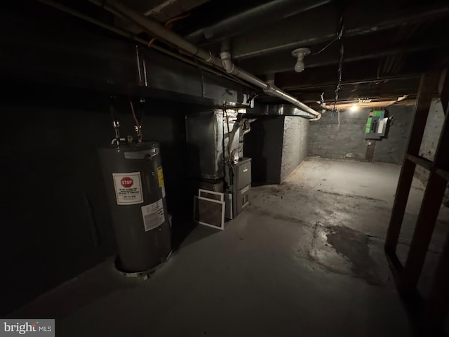 unfinished basement with water heater and heating unit