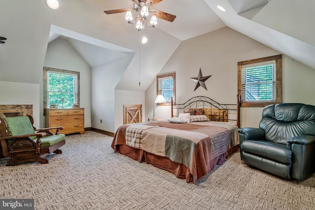 carpeted bedroom featuring multiple windows, vaulted ceiling, baseboards, and a ceiling fan