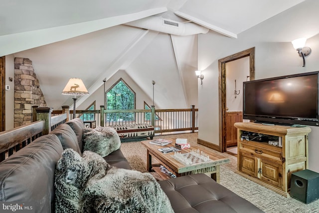living area featuring visible vents and lofted ceiling with beams