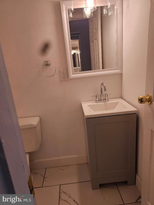 1569 Charlestown Dr, Edgewood, MD 21040 - half bath with marble finish floors, baseboards, vanity, and toilet