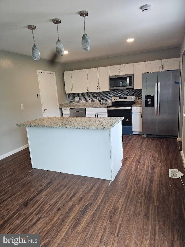 1569 Charlestown Dr, Edgewood, MD 21040 - kitchen with stainless steel appliances, dark wood finished floors, white cabinets, hanging light fixtures, and recessed lighting