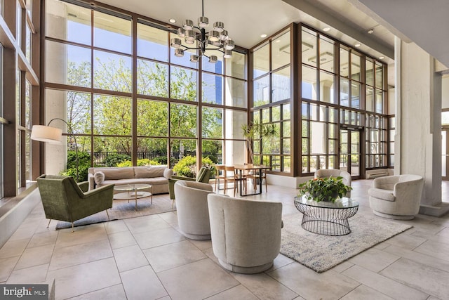 lobby with a towering ceiling and expansive windows