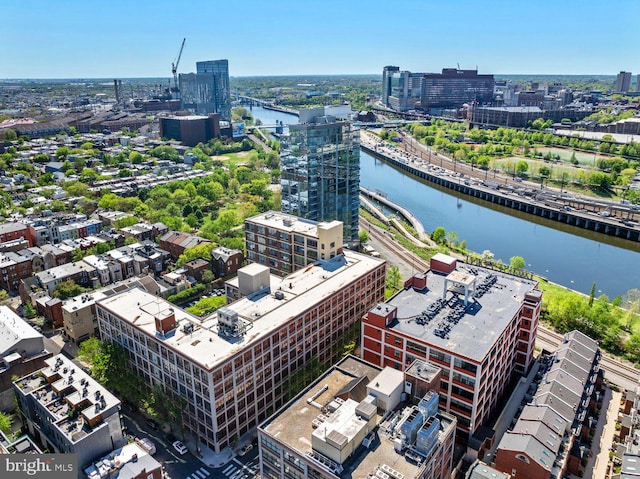 view of urban area with a large body of water