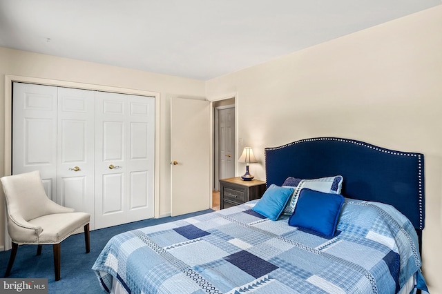 carpeted bedroom featuring a closet
