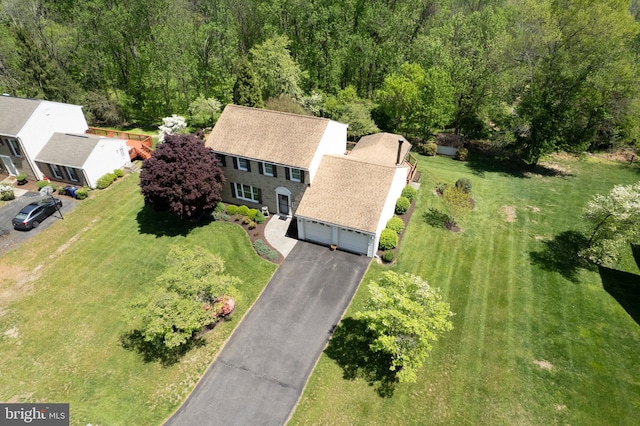 drone / aerial view with a forest view