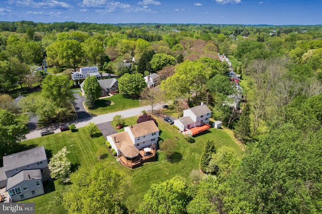 drone / aerial view with a view of trees
