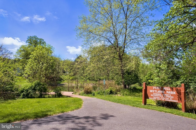 surrounding community with a lawn