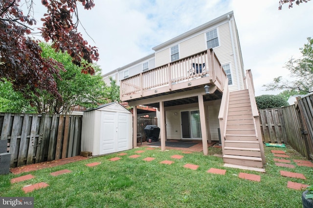 34 Starboard Ct, Gaithersburg, MD 20877 - back of property with a shed, a wooden deck, stairway, and an outdoor structure