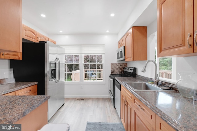 34 Starboard Ct, Gaithersburg, MD 20877 - kitchen with appliances with stainless steel finishes, a sink, light wood-style flooring, recessed lighting, and baseboards